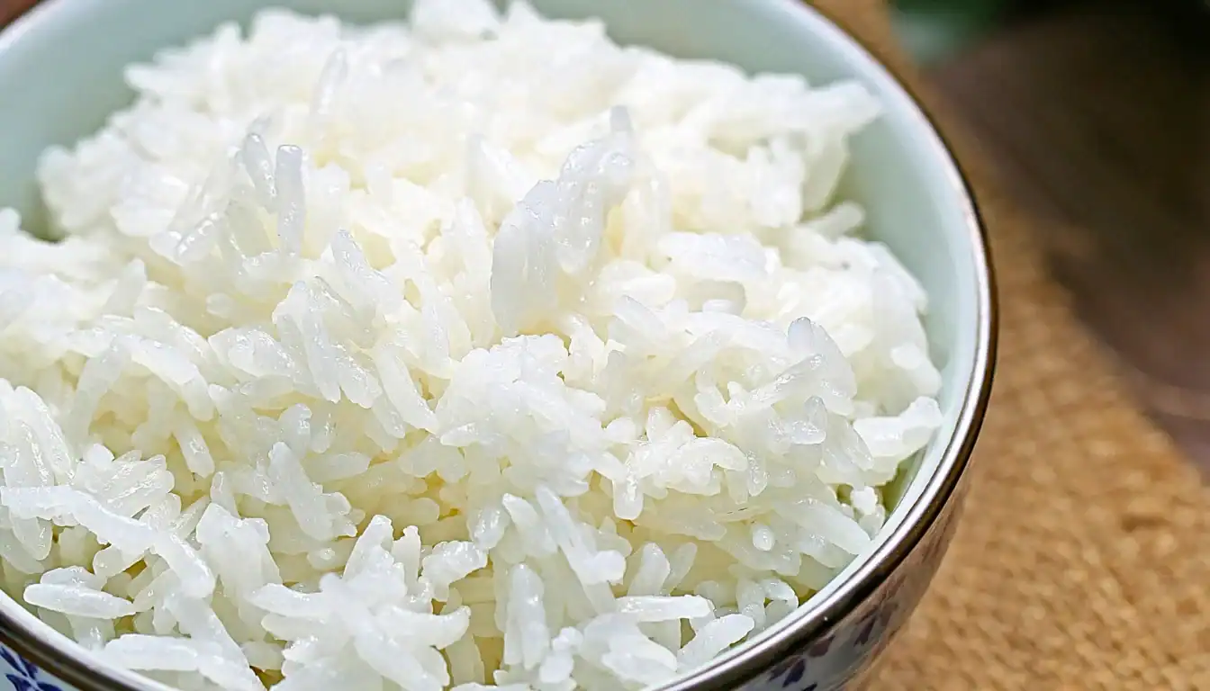 Cooled rice for resistant starch in weight loss - cooked rice left to cool beside a timepiece, high nutrition value